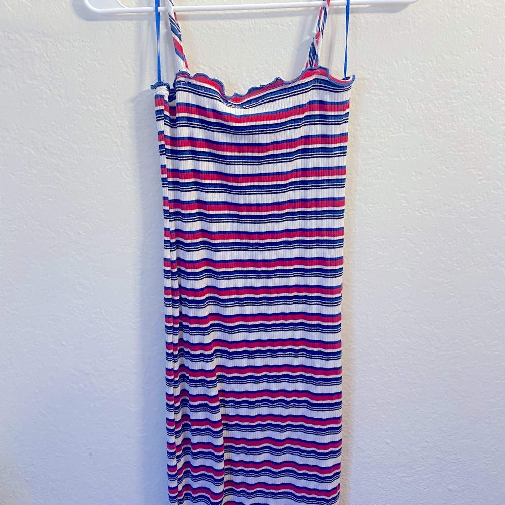 Size small dress, body hugging and ribbed :)